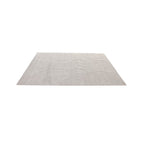A large beige rug