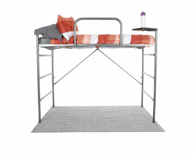 A three-bolt metal loft with a safety bar and a pop-out shelf situated above a grey rug