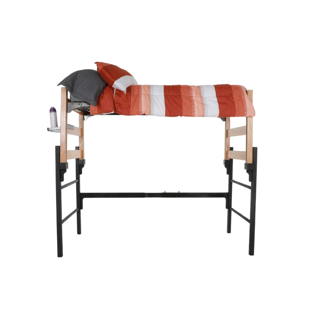 A wooden and metal loft with an orange and white comforter and pop-out shelf