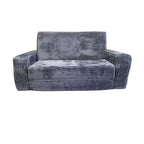 A plush futon in a couch-like position