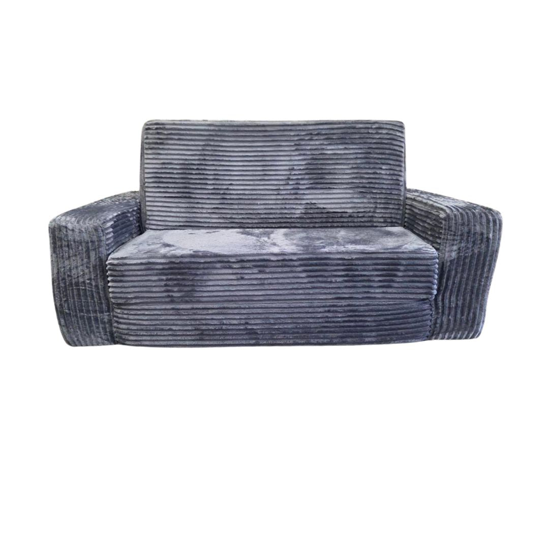 A plush futon in a couch-like position