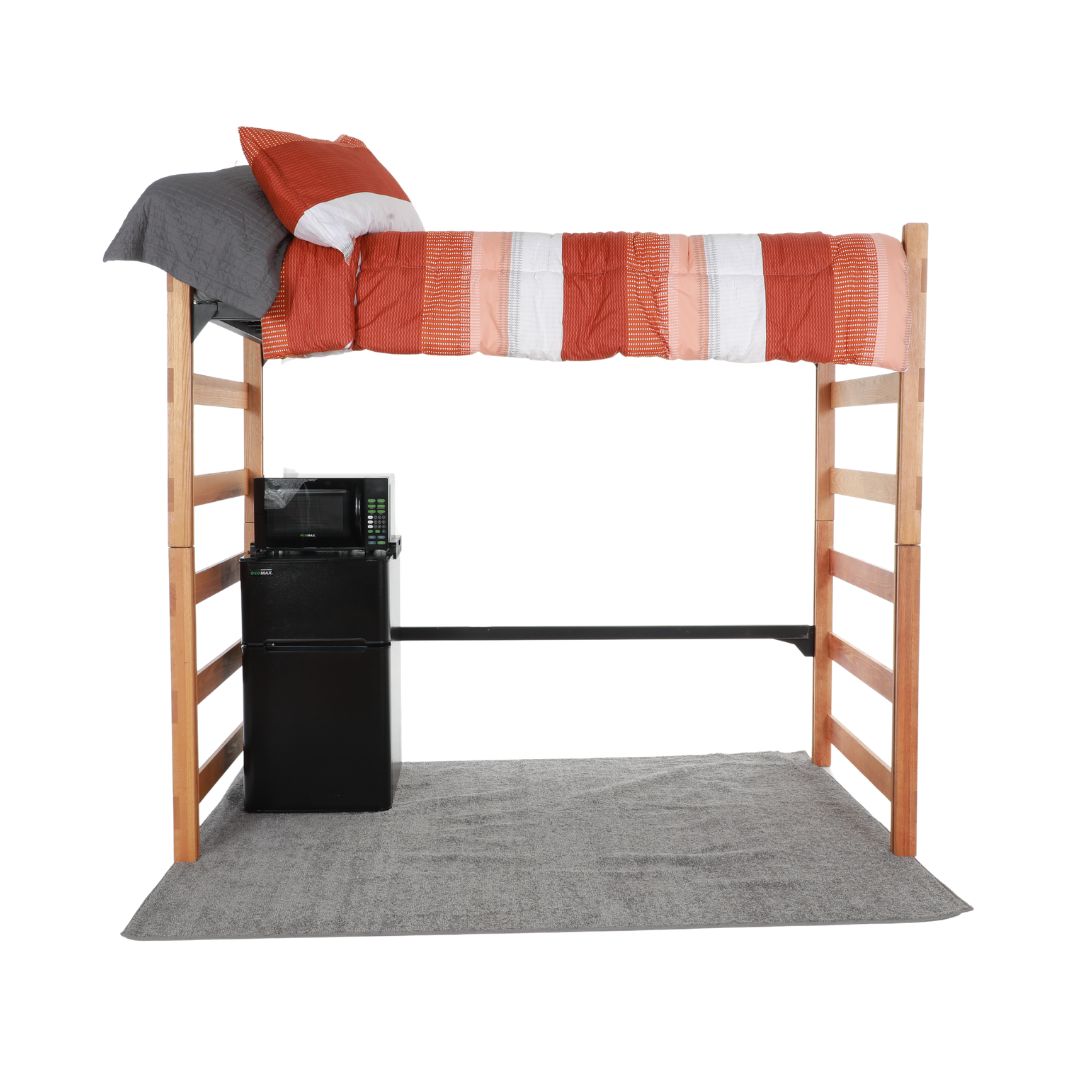A wooden bed loft with a refrigerator and freezer unit underneath it, sitting on top of a large grey rug 