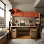A dorm room setup with a bed loft, desk, and seating in a grey and orange color palette