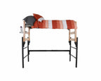 A wooden and metal bed loft with an exterior pop-out shelf and orange and white comforter